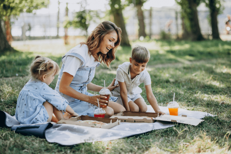 Mother and children having a picnic